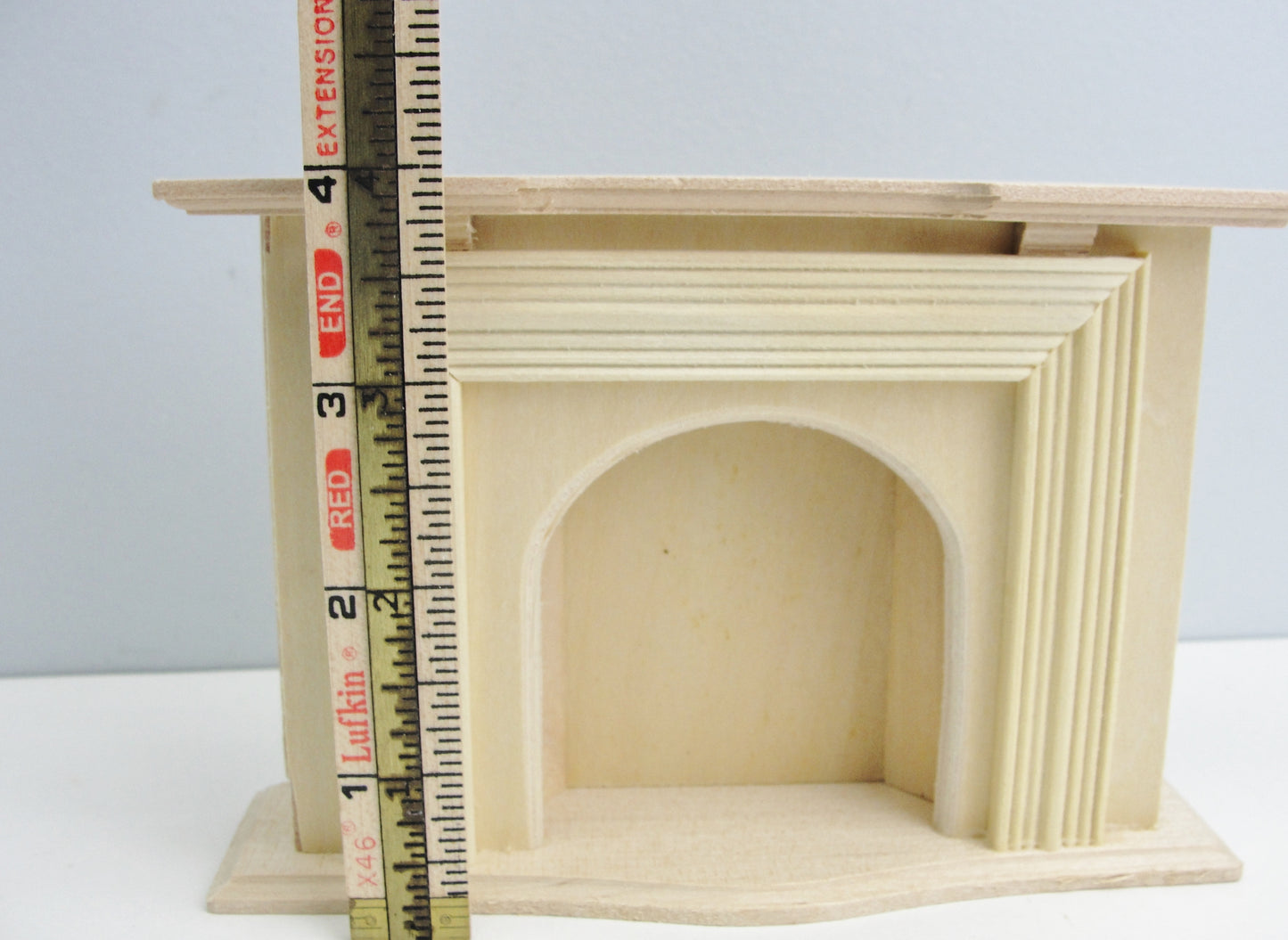 Unfinished dollhouse fireplace