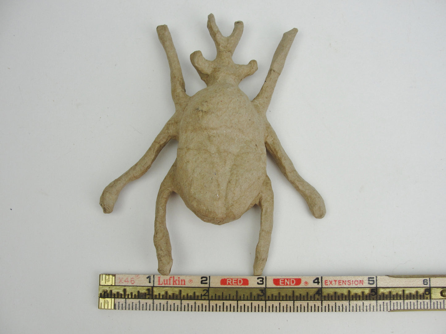 Oversized large paper mache beetle