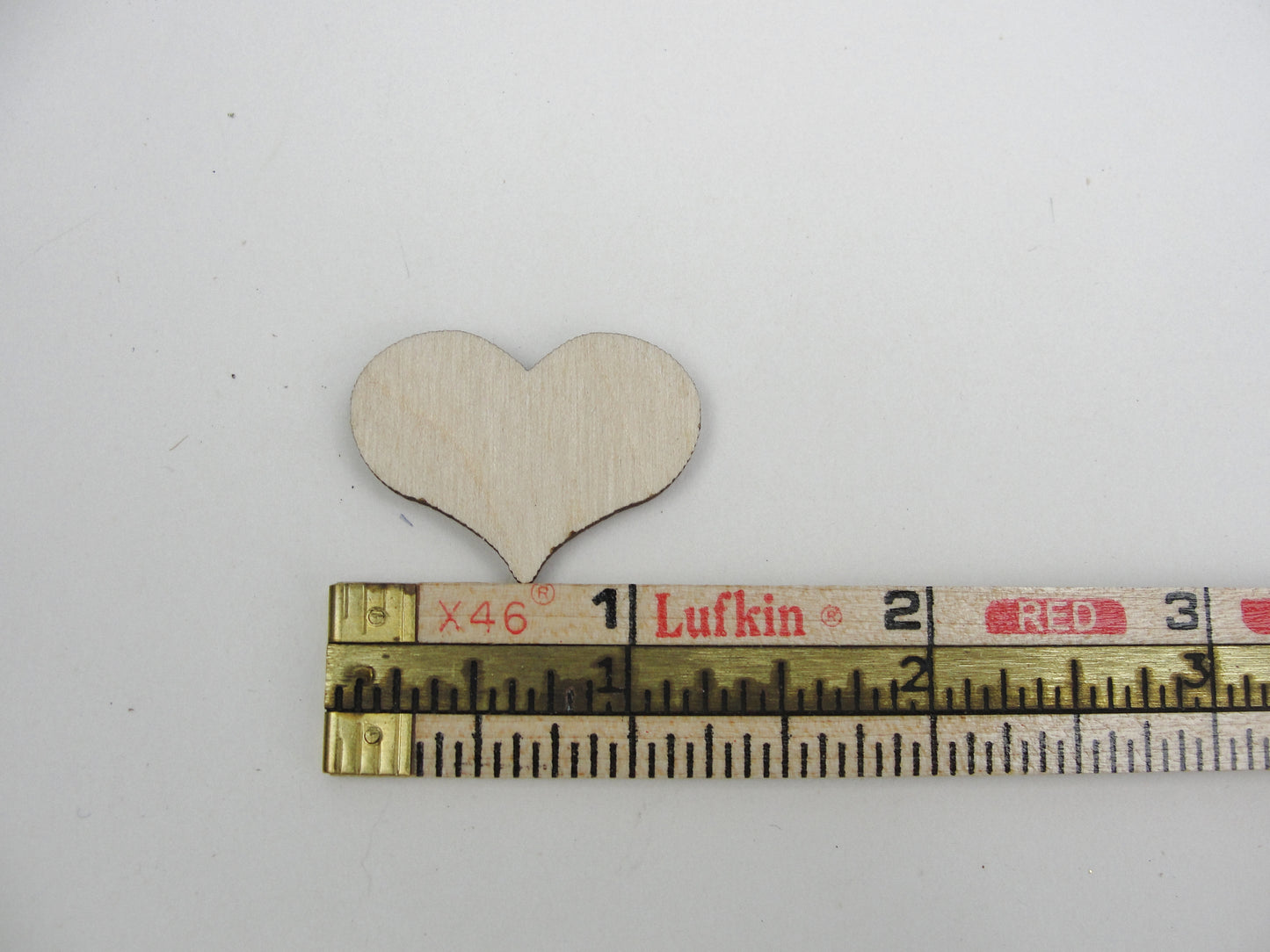 12 Wooden country hearts 1 1/4 inch (1.25") wide 1/8" thick