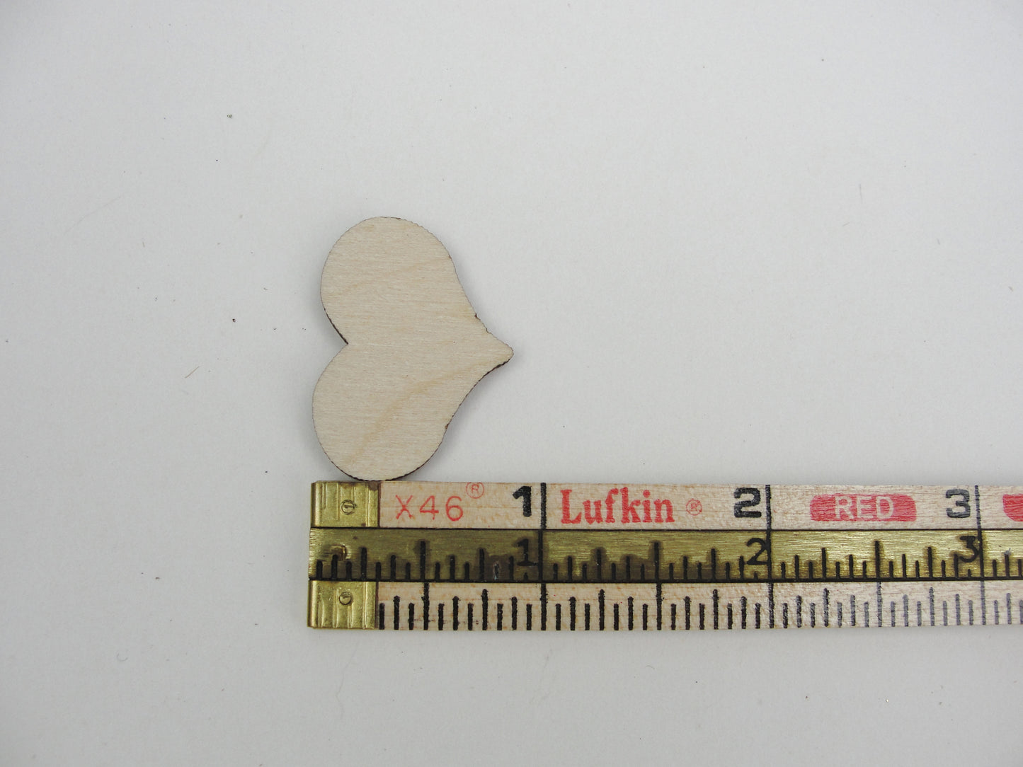 12 Wooden country hearts 1 1/4 inch (1.25") wide 1/8" thick