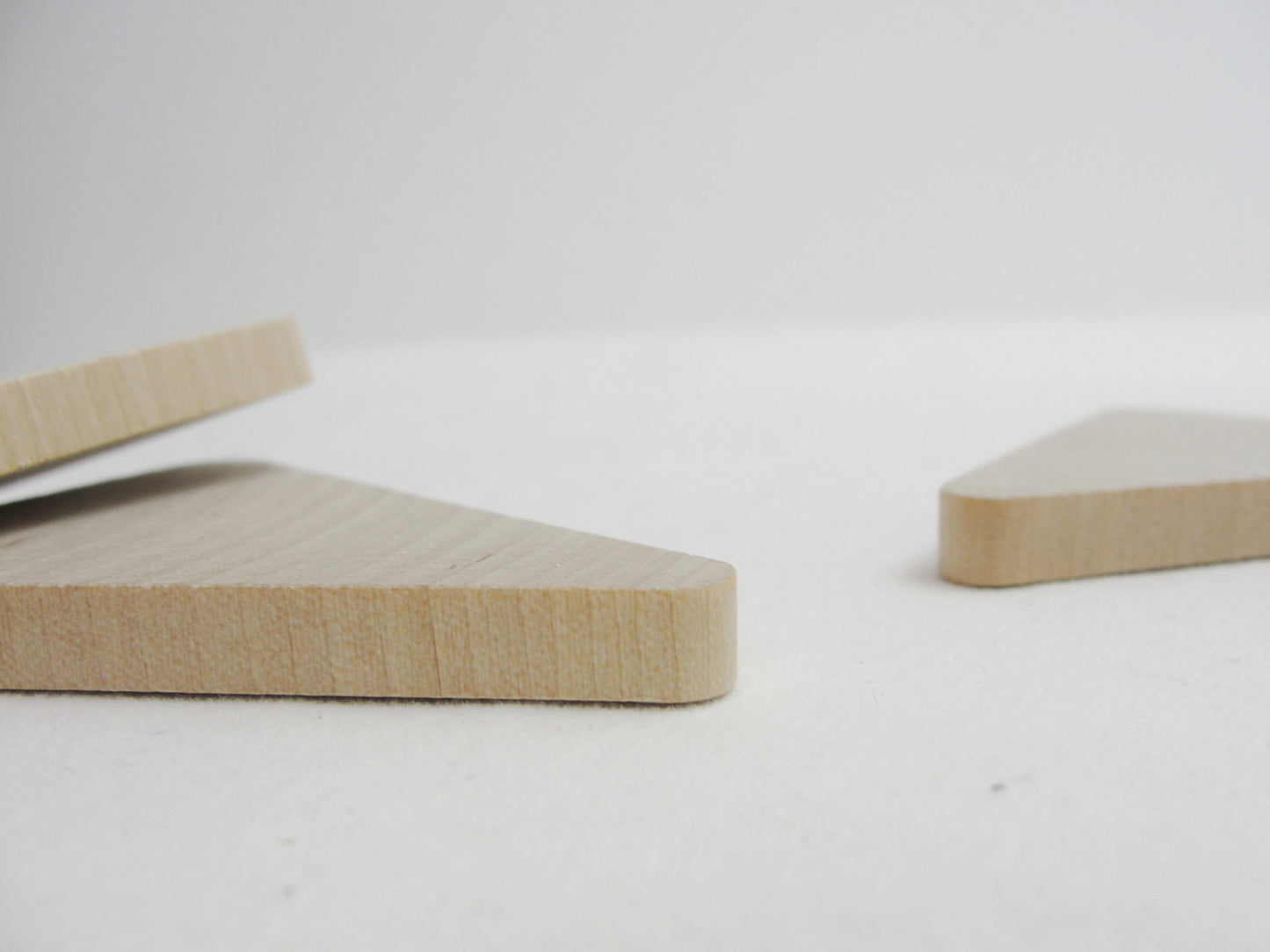 Wooden Triangle 2" wide x 2 1/2" tall x 1/4" thick unfinished DIY set of 6 - Wood parts - Craft Supply House