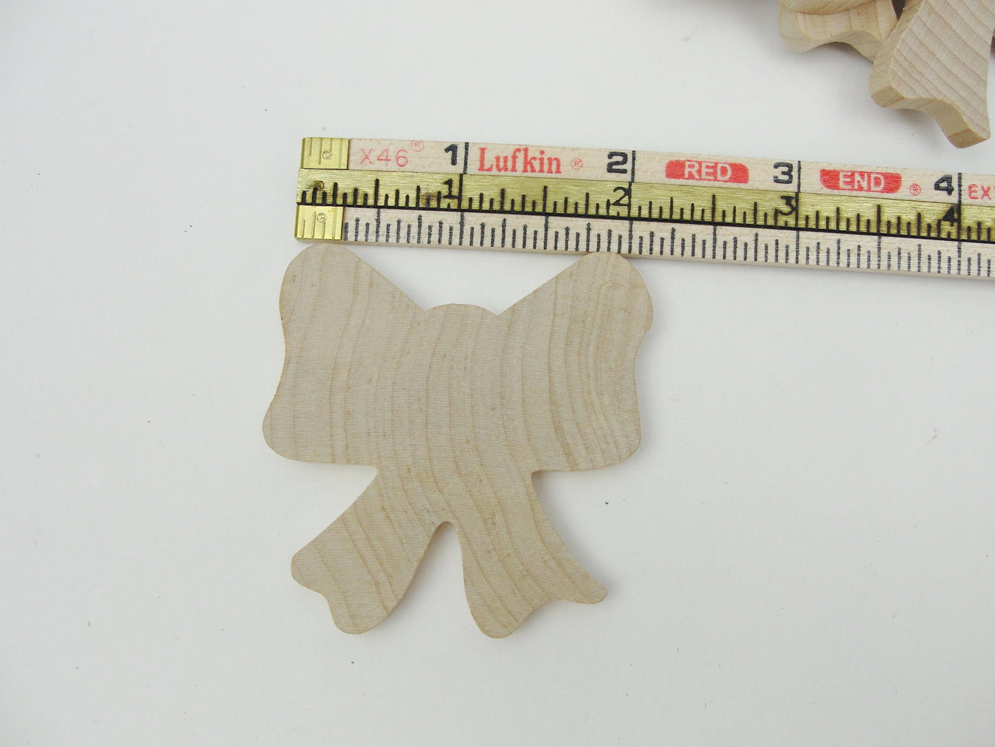 Wooden bow 2 1/4" x 2 1/8" x 1/4" set of 6 - Wood parts - Craft Supply House