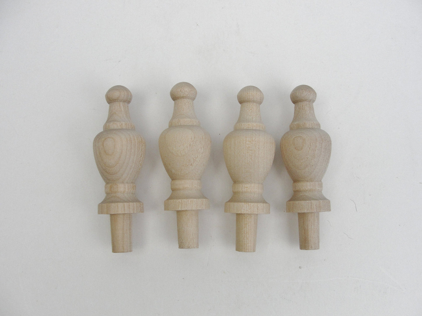 Small decorative wooden finial set of 4