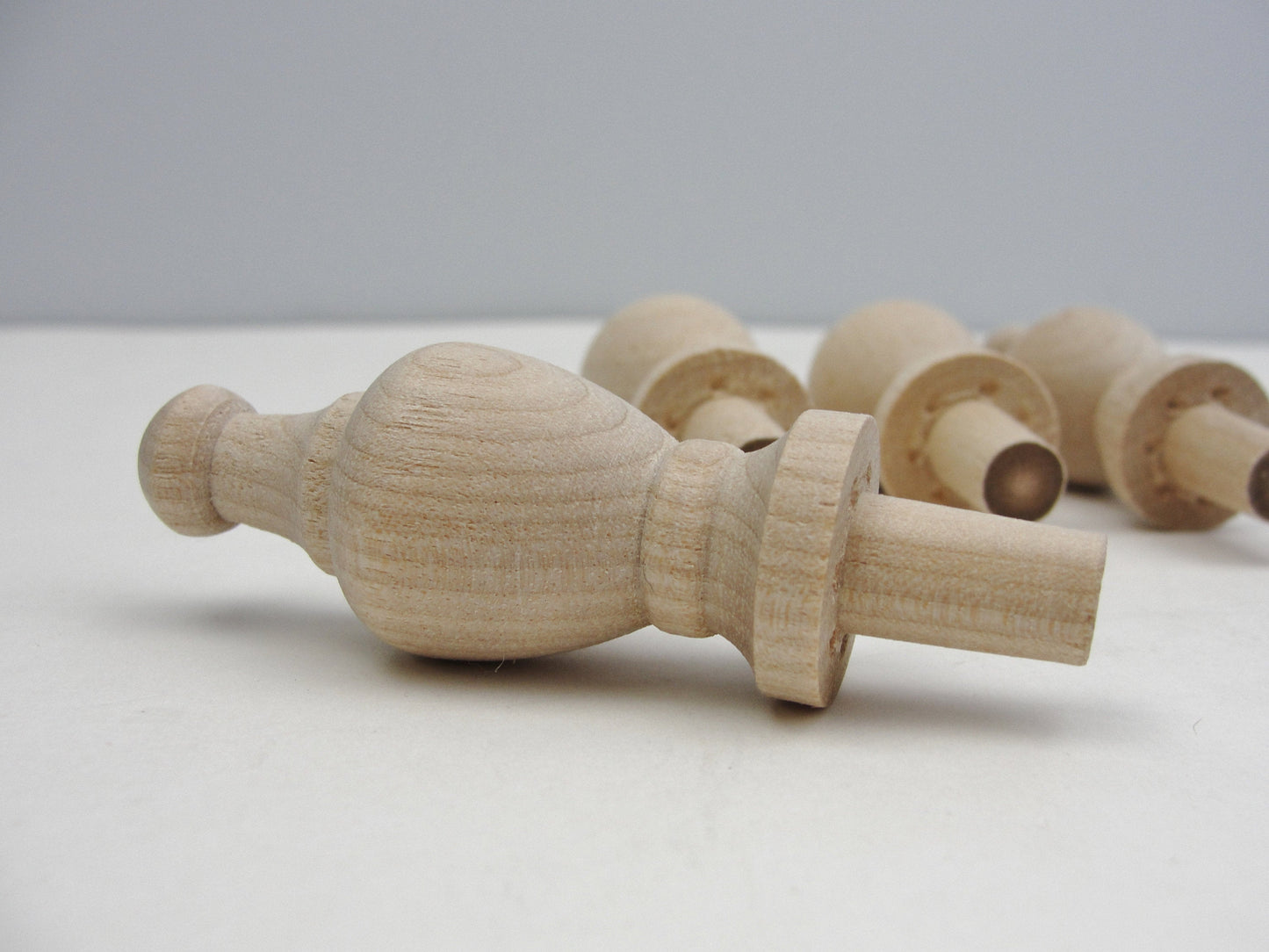 Small decorative wooden finial set of 4