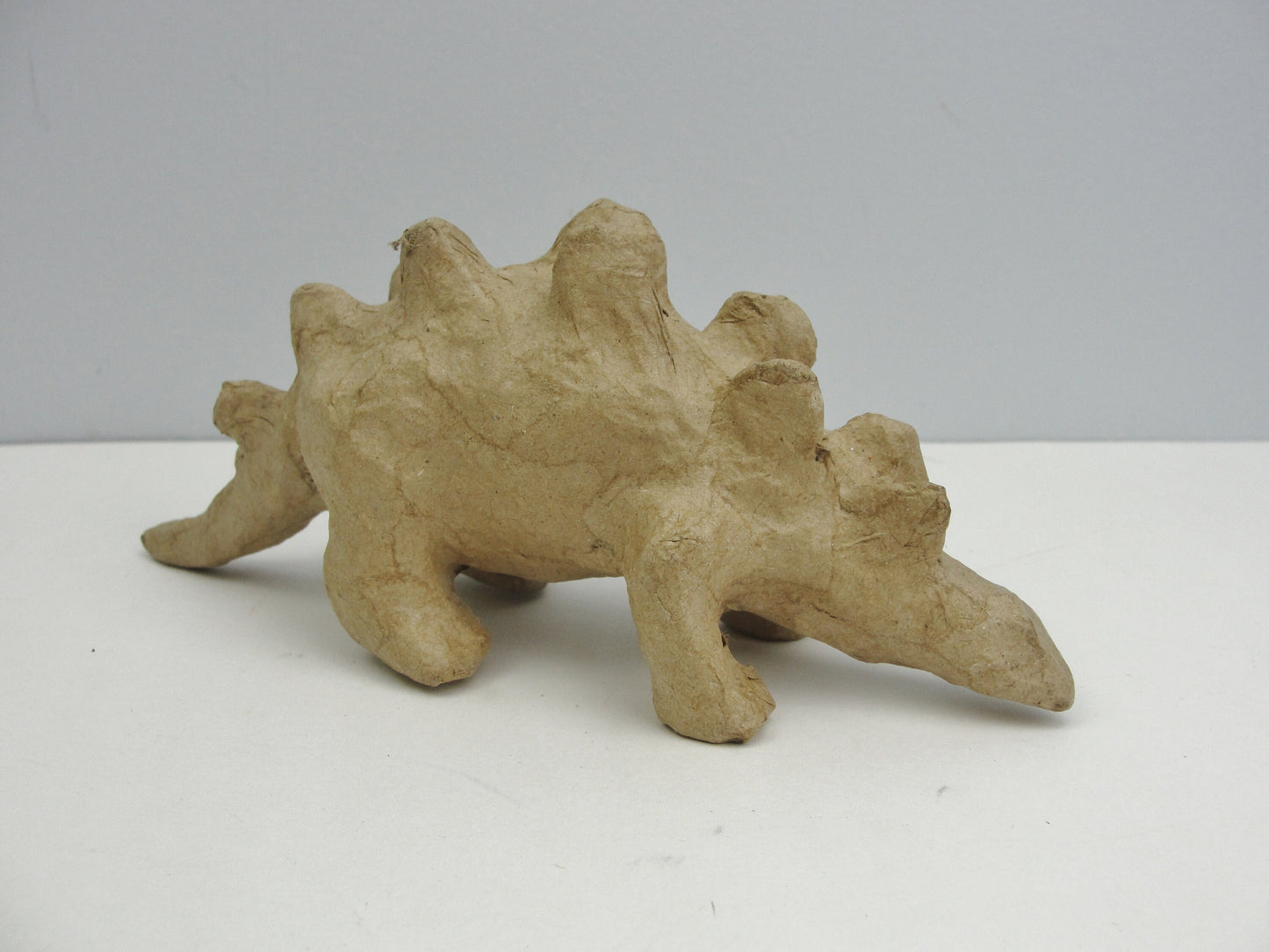 Small Paper mache Stegosaurus dinosaur