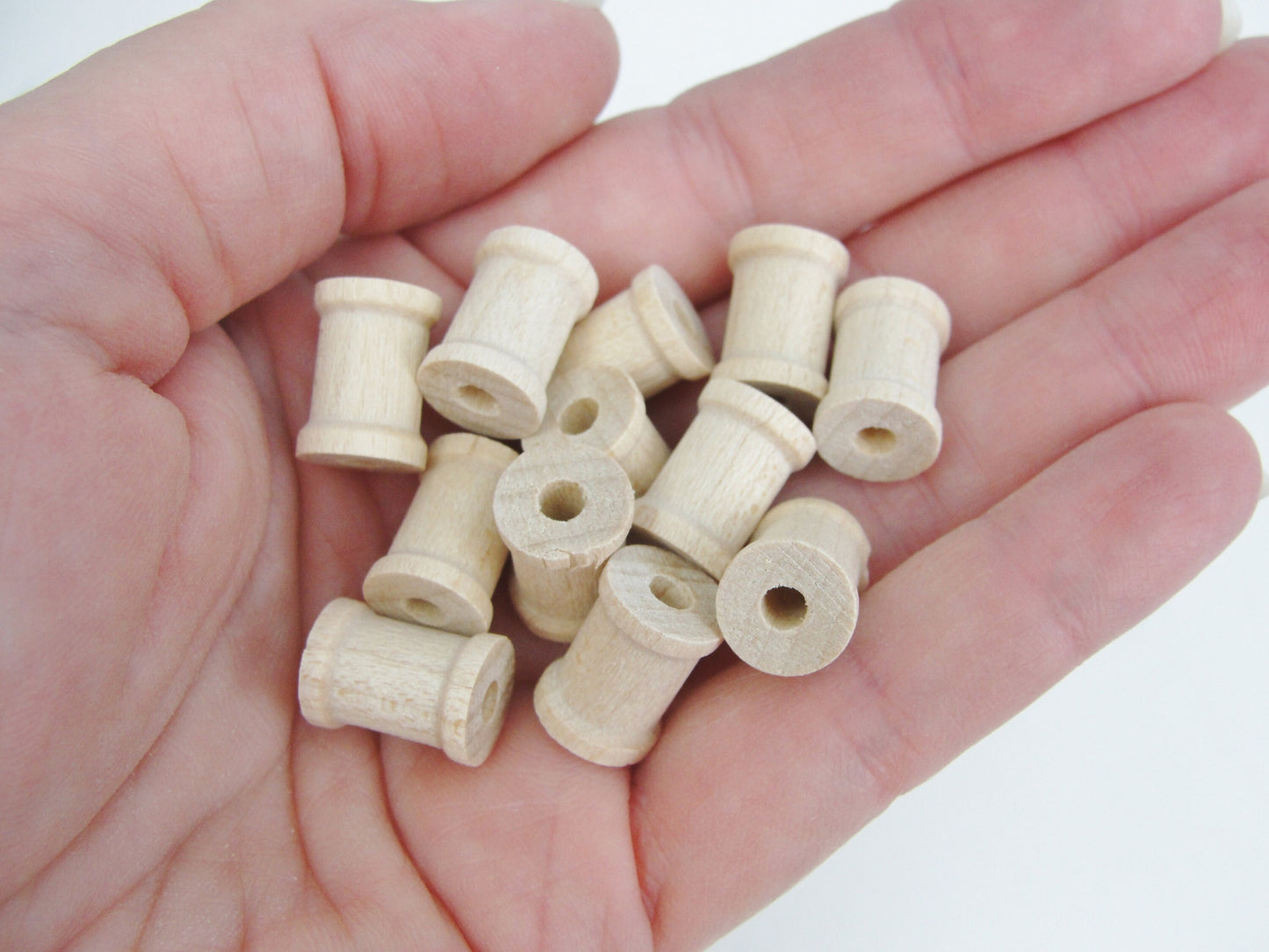 Little wooden spools 1/2" x 3/8" set of 12, wood spools