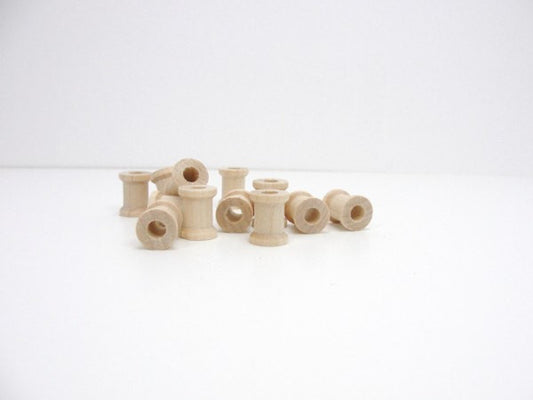 Miniature wooden spools 5/8 inch set of 12 - Wood parts - Craft Supply House