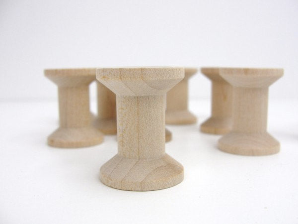 12 Wooden spools 11/8" tall - Wood parts - Craft Supply House