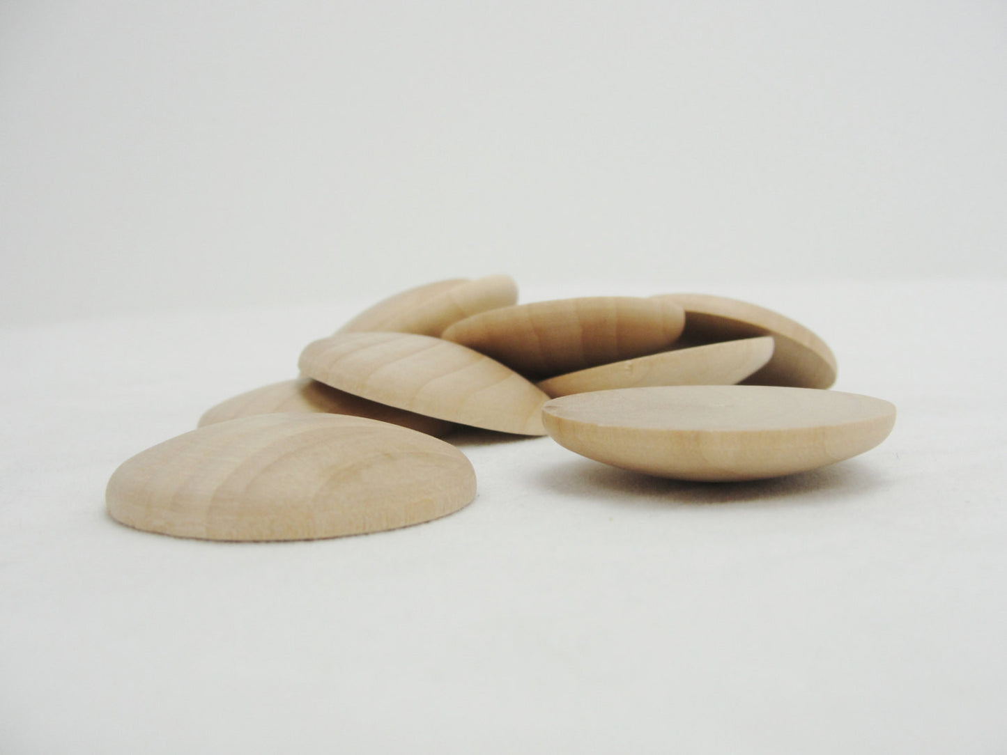 Wooden domed disc Circles 1 1/2" wide x 5/16" thick set of 12 - Wood parts - Craft Supply House