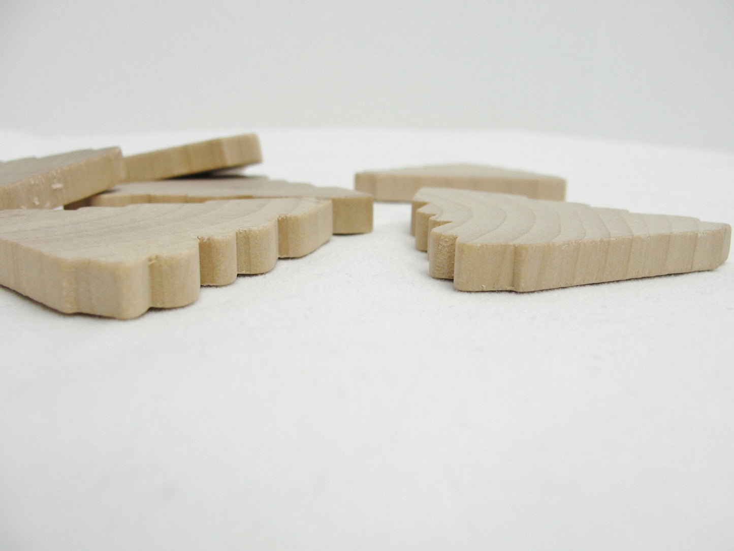 Wooden tree cutout 2 1/4" tall set of 6 - Wood parts - Craft Supply House