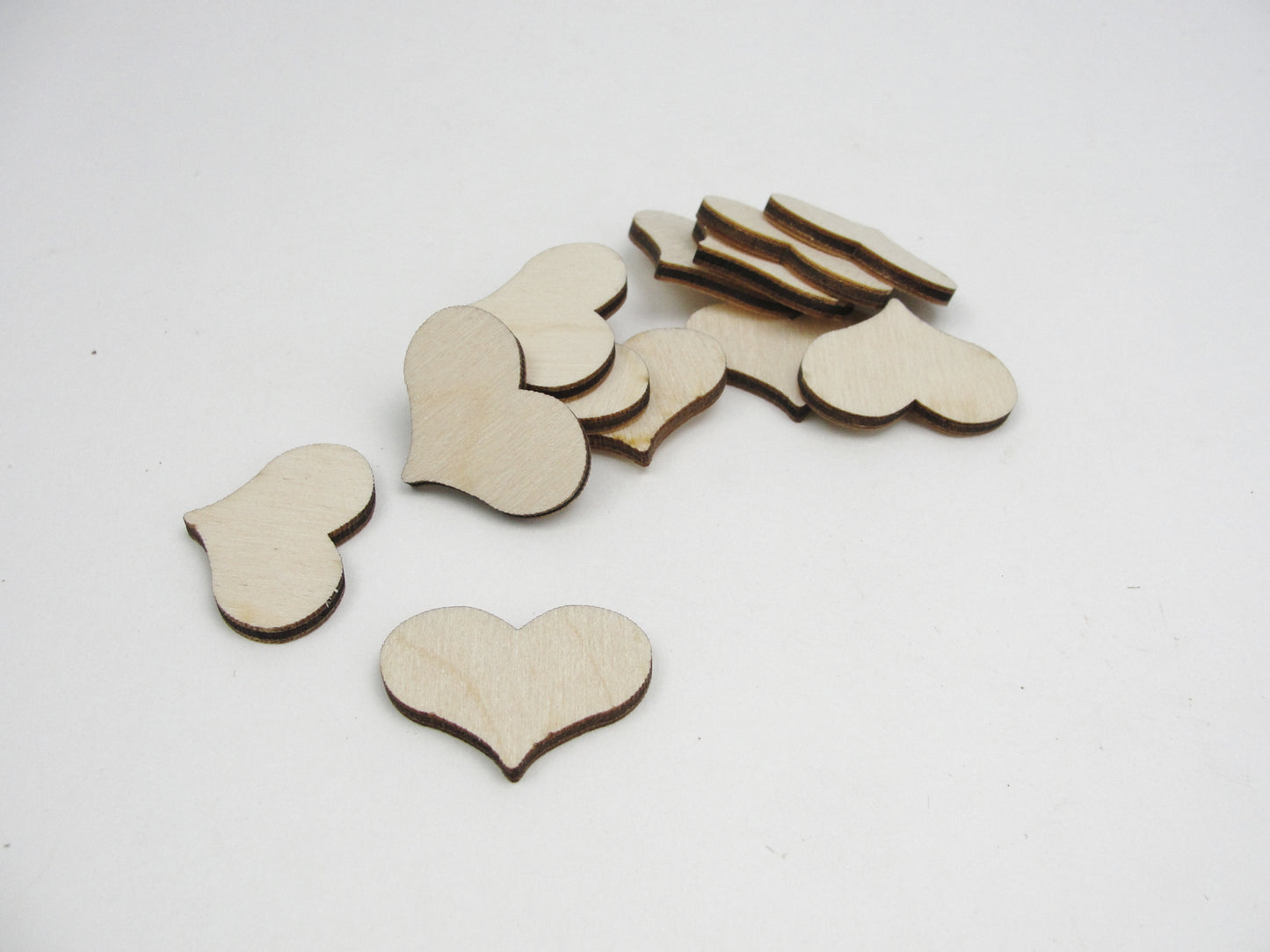 12 Wooden country hearts 1 1/4 inch (1.25") wide 1/8" thick