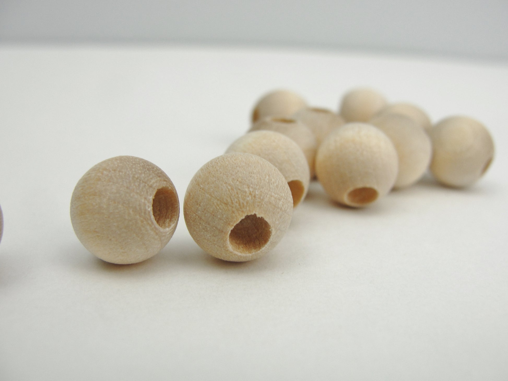 Wooden round bead 3/8" (.41") 10mm with 5/32" hole - Wood parts - Craft Supply House