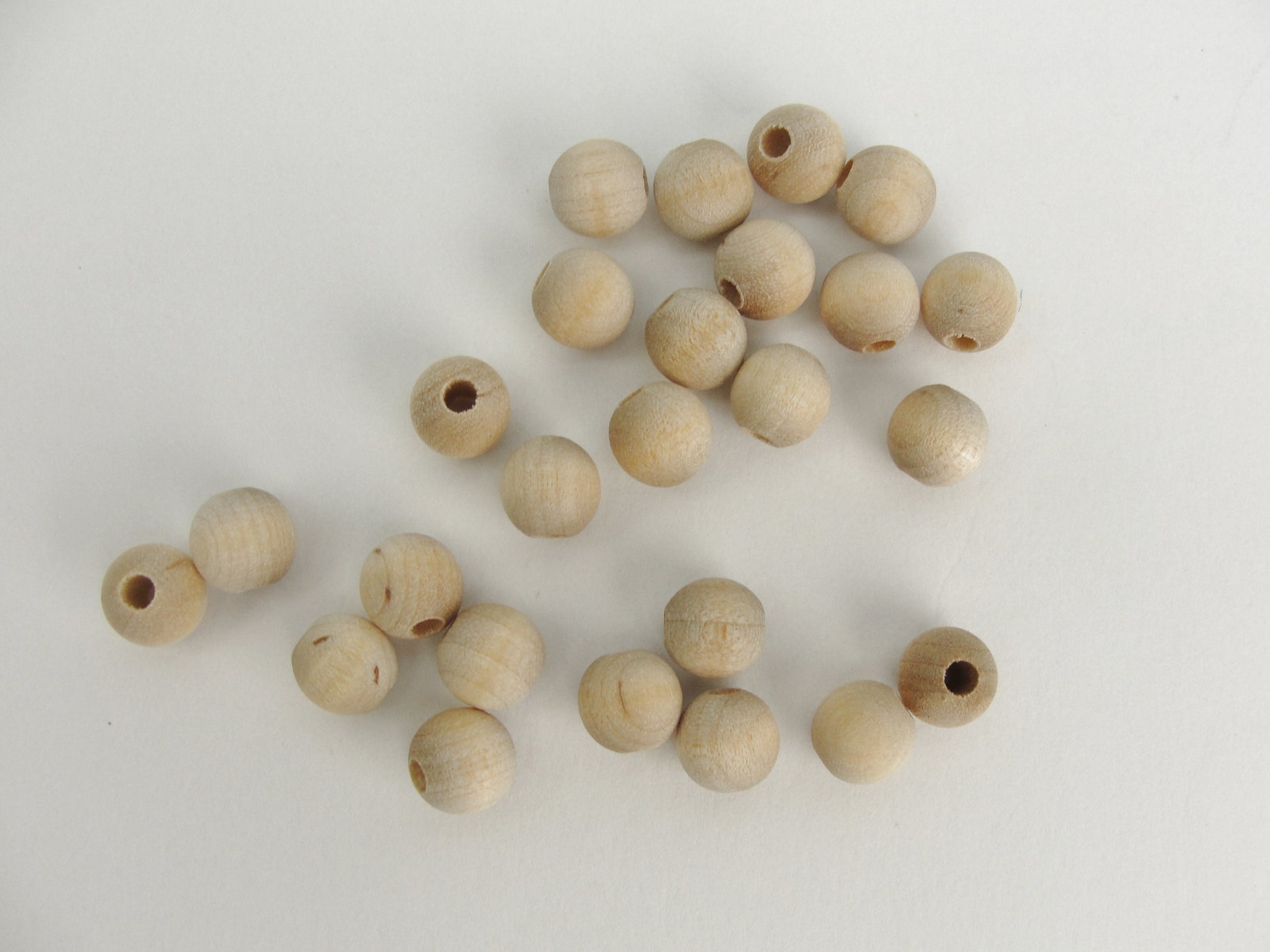 Unfinished wooden beads 8mm 1/4" (.25") with 7/64" hole - Wood parts - Craft Supply House
