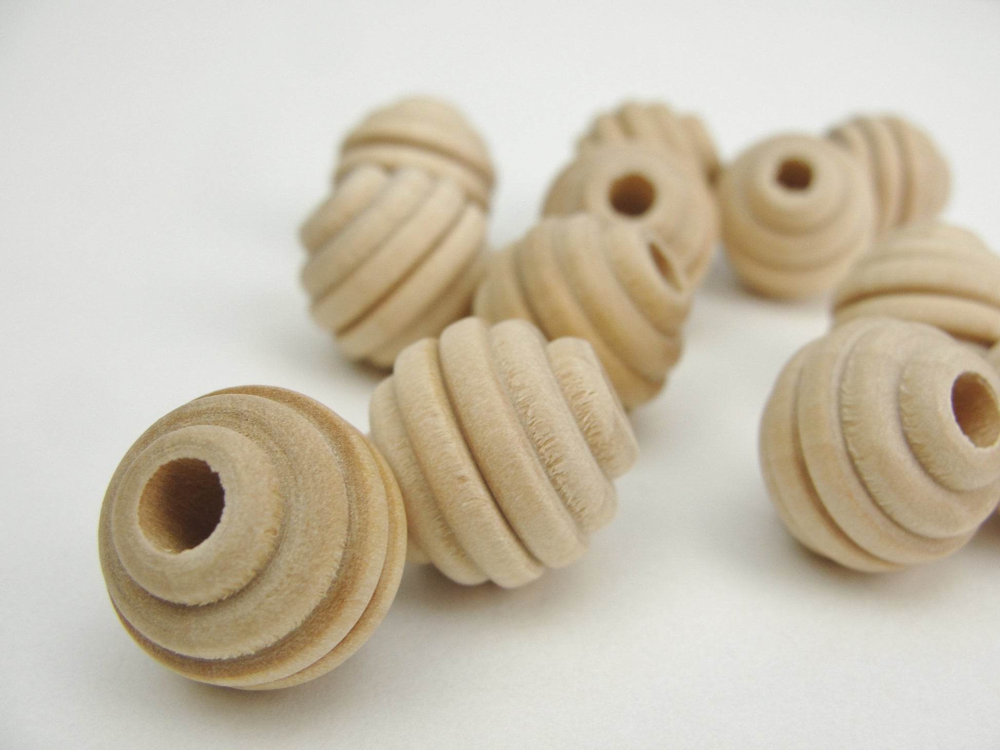 Wood beehive beads 5/8" with a 3/16" hole - Wood parts - Craft Supply House