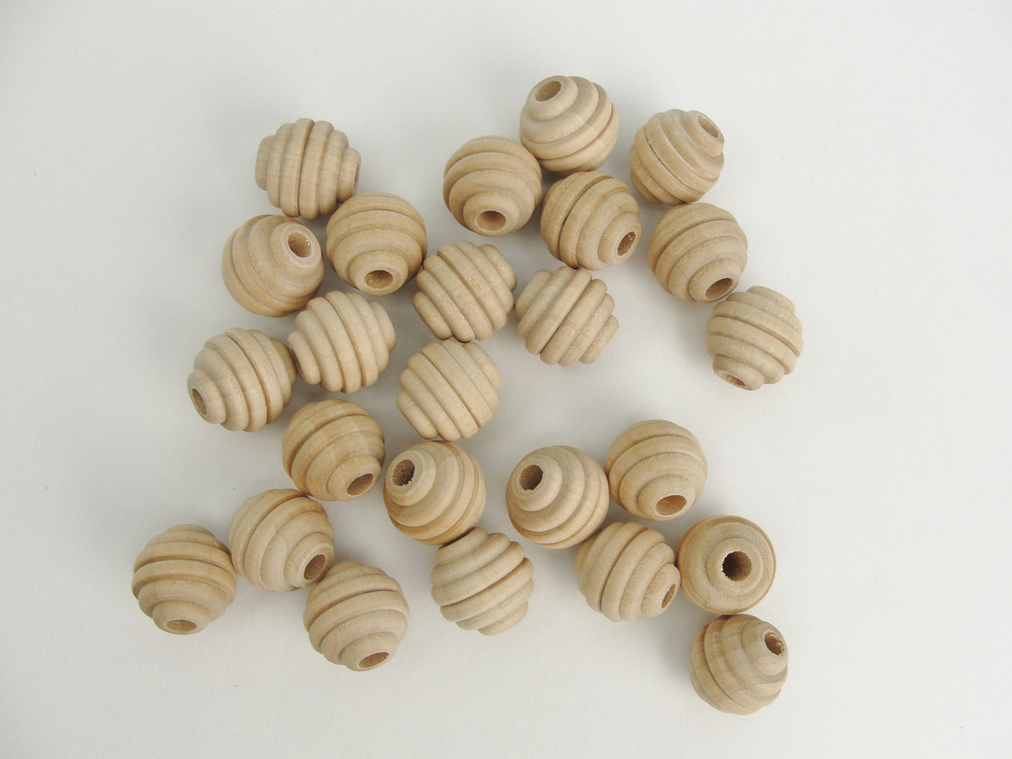 Wood beehive beads 5/8" with a 3/16" hole - Wood parts - Craft Supply House