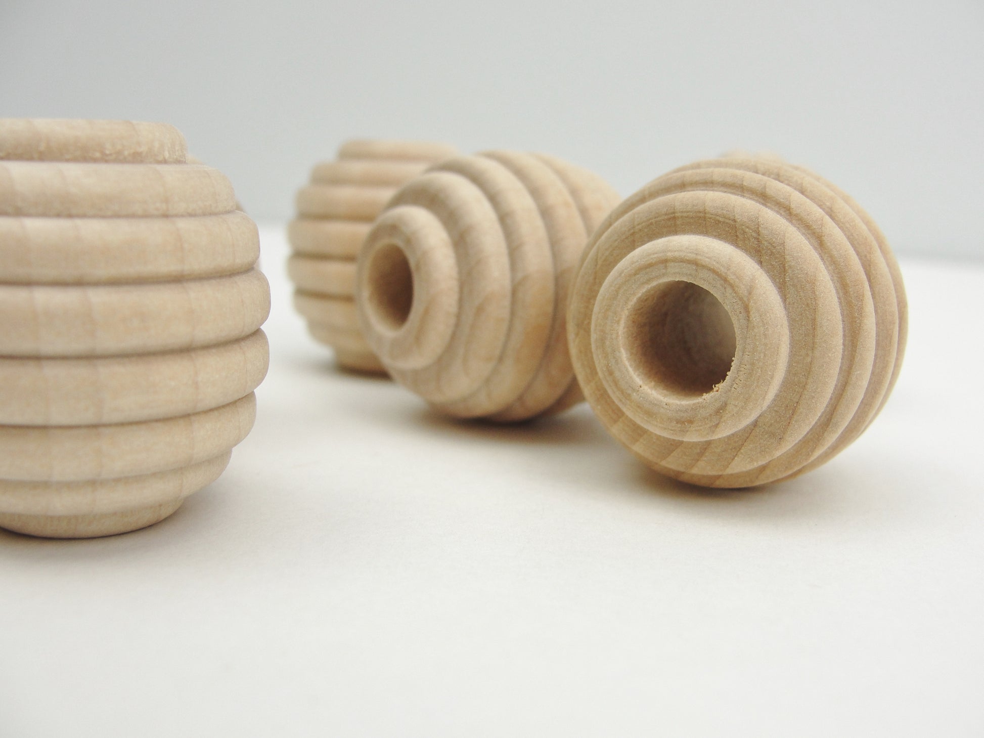 Wooden beehive beads 1" x 1" with a 5/16" hole - Wood parts - Craft Supply House