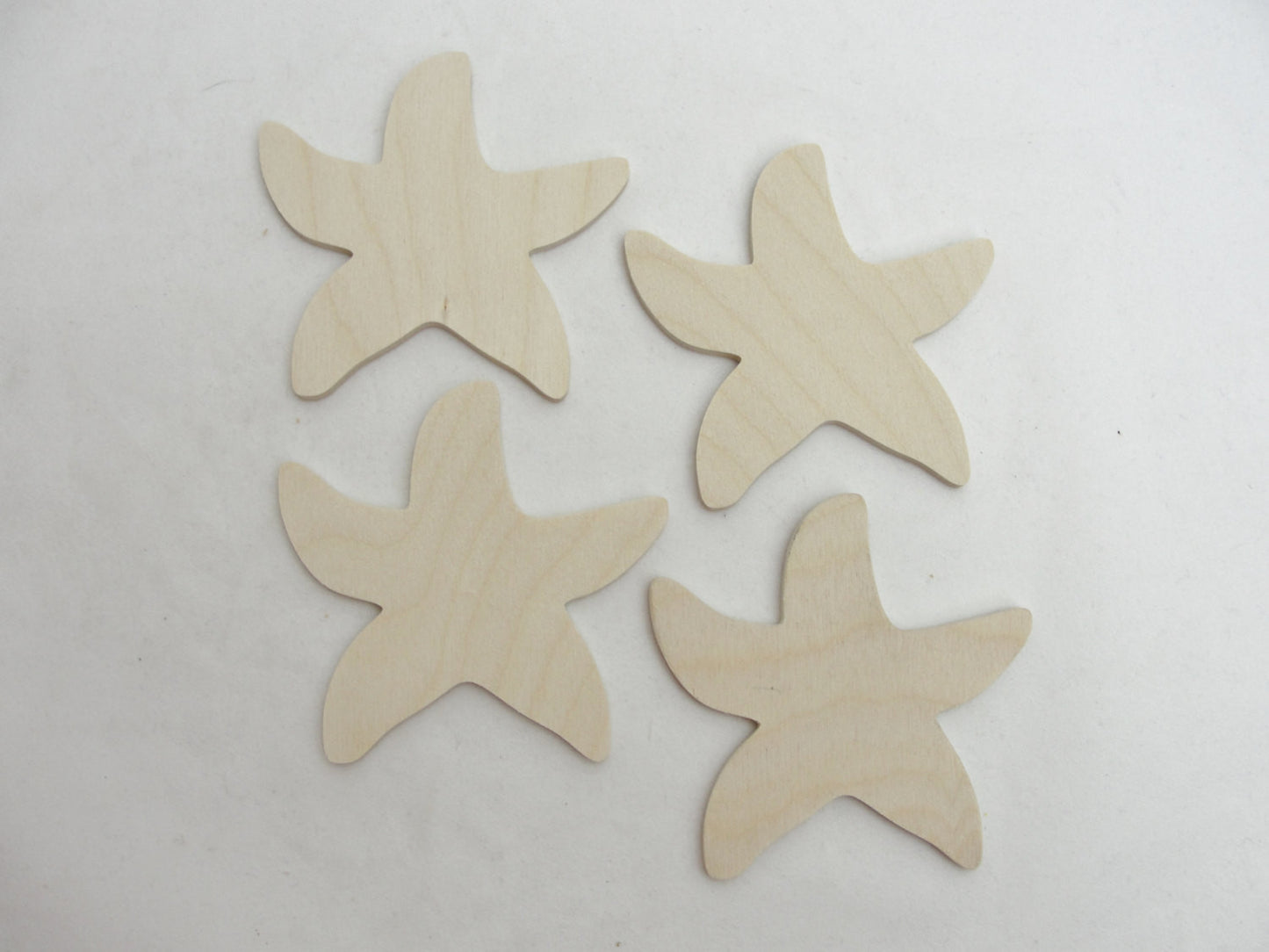 Starfish cutout set of 4 - Wood parts - Craft Supply House