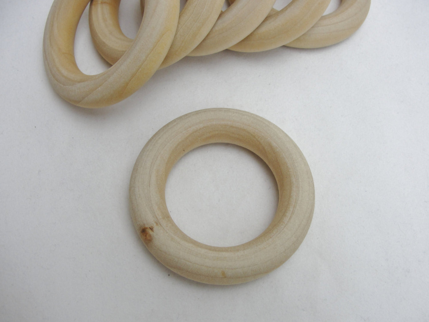 6 Wooden rings 2 1/2" with 1 1/2" inside dimension - Wood parts - Craft Supply House