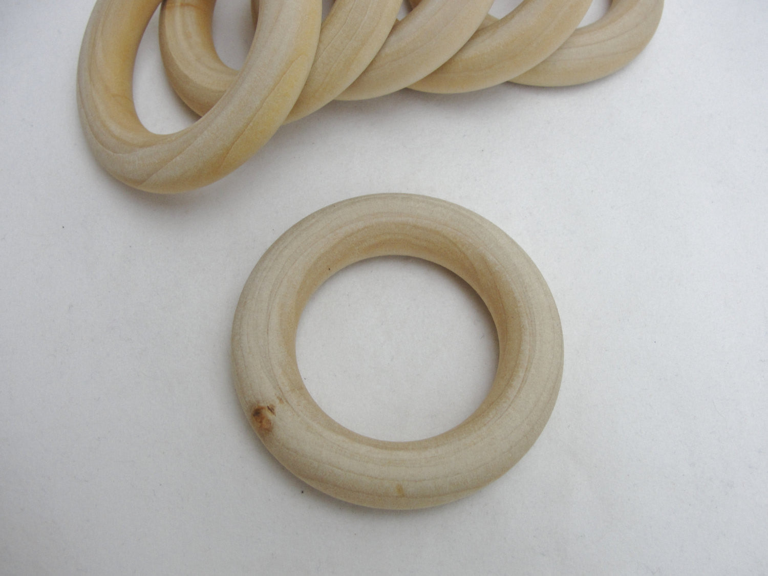 6 Wooden rings 2 1/2" with 1 1/2" inside dimension - Wood parts - Craft Supply House