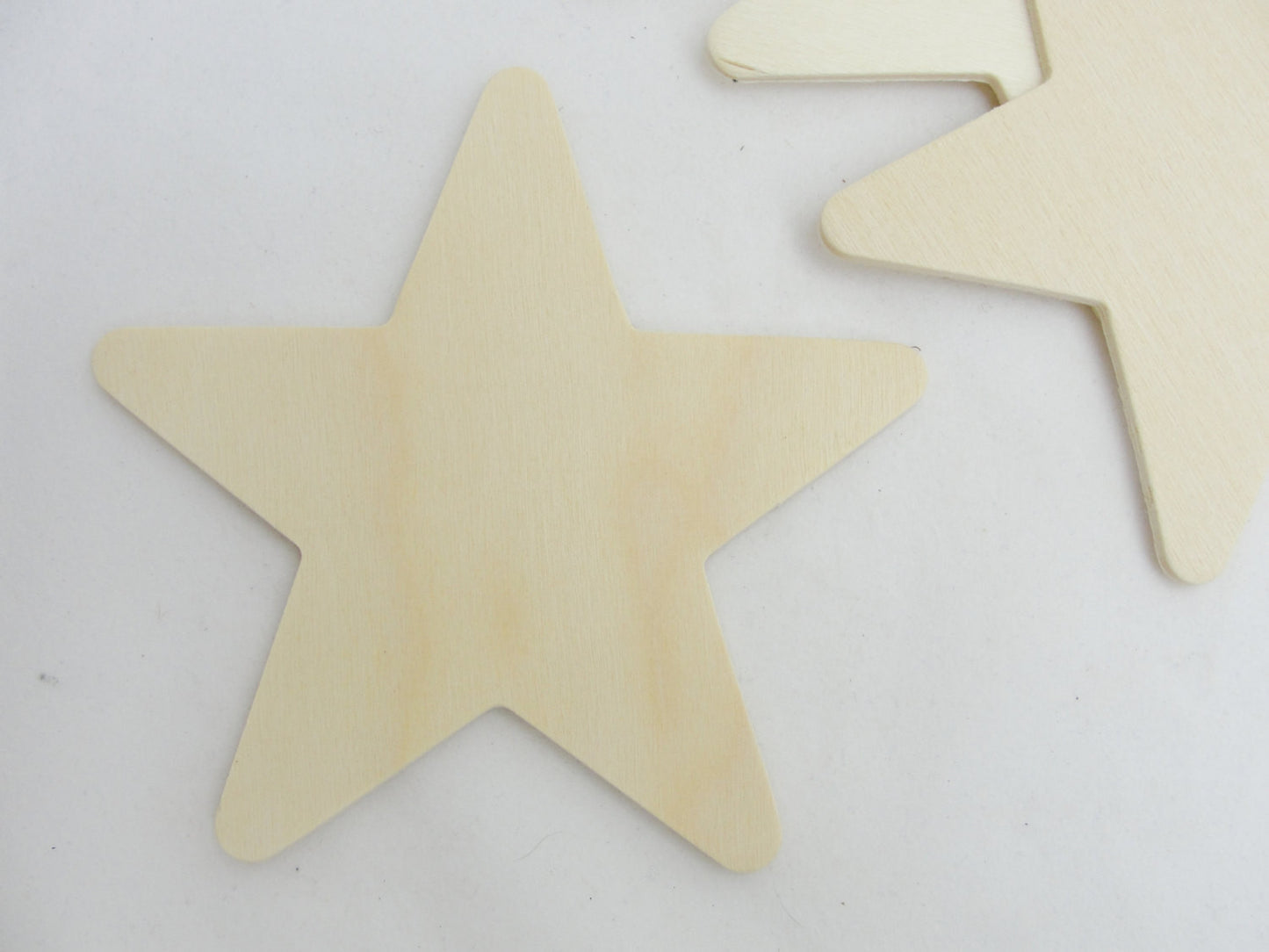 Traditional 4 inch (4") wooden stars 1/8" thick set of 5 - Wood parts - Craft Supply House