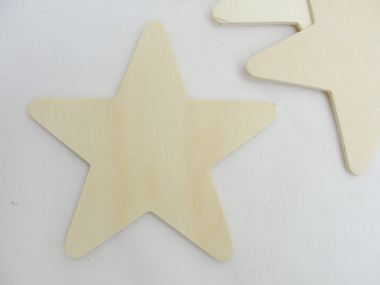 Traditional 4 inch (4") wooden stars 1/8" thick set of 5 - Wood parts - Craft Supply House
