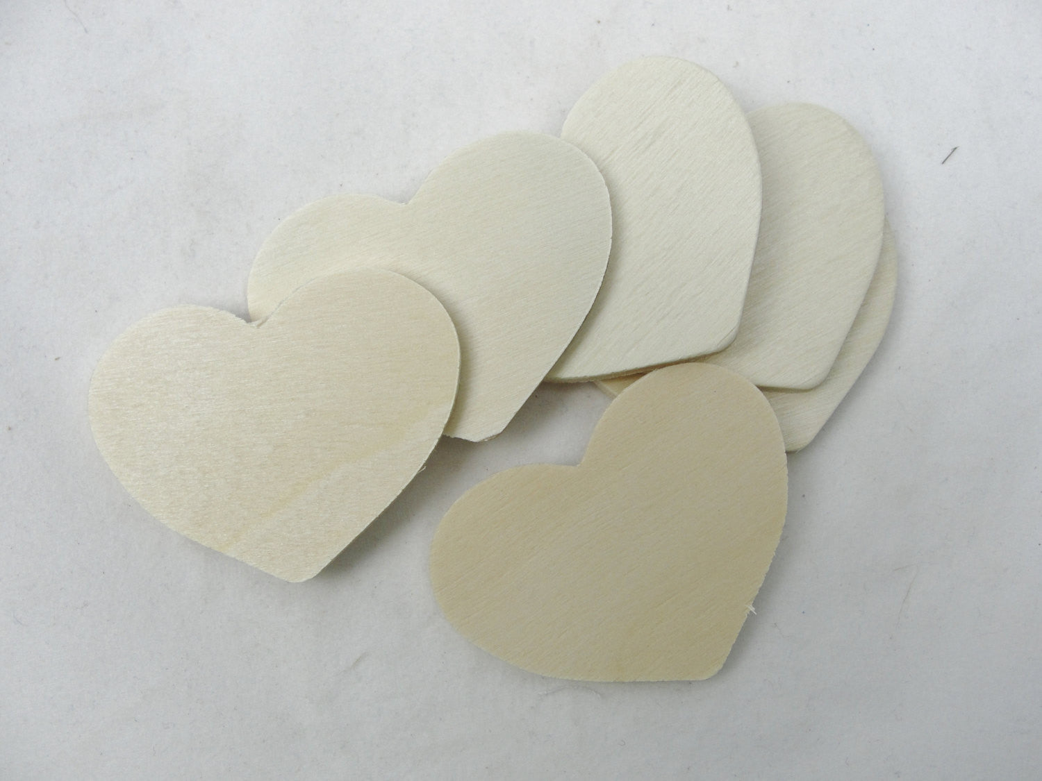 6 wooden country hearts 2" wide 1 1/2" tall 1/8" thick unfinished - Wood parts - Craft Supply House