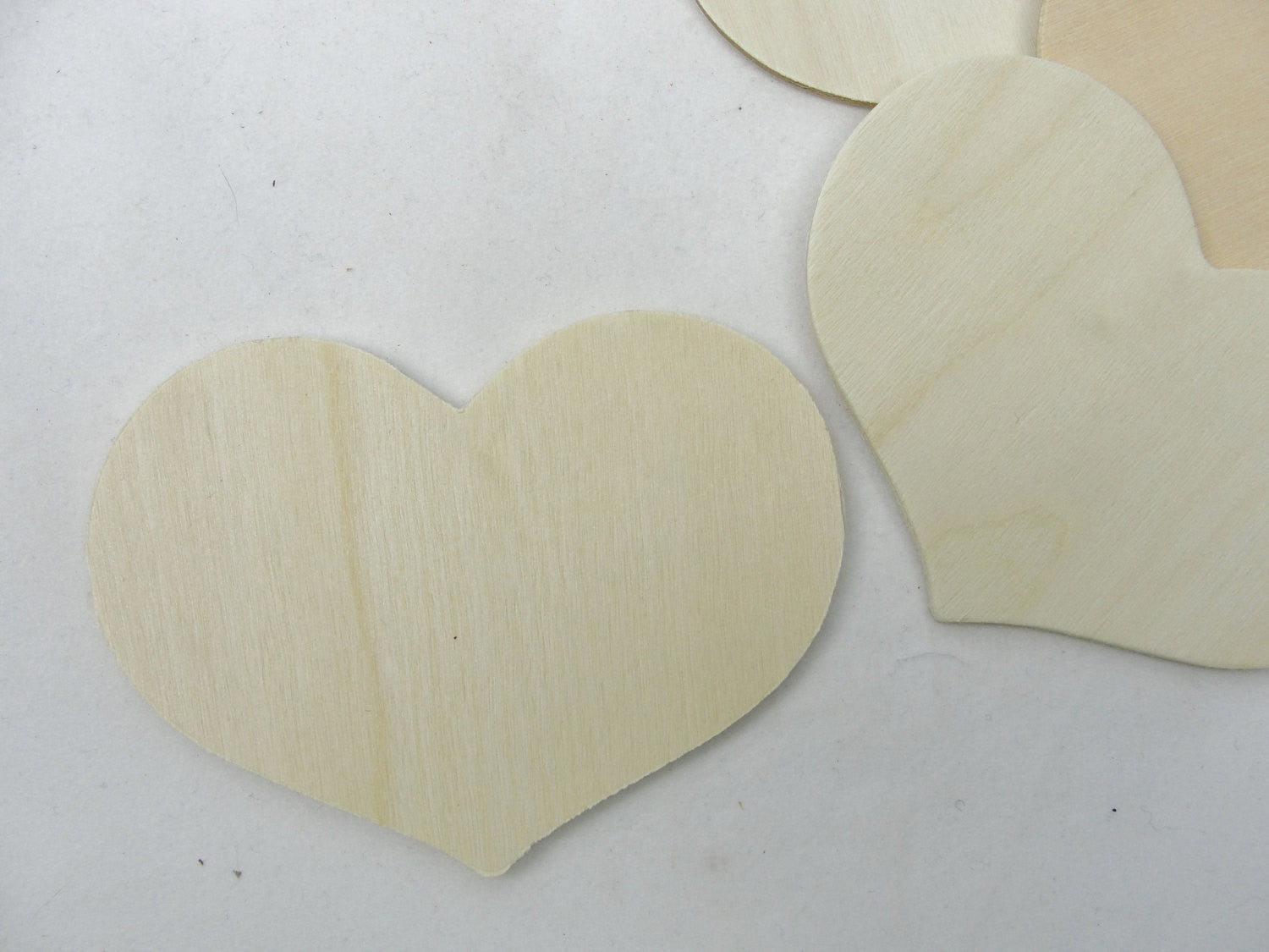 5 wooden country hearts 3 3/8" wide 2 1/2" tall 1/8" thick unfinished - Wood parts - Craft Supply House