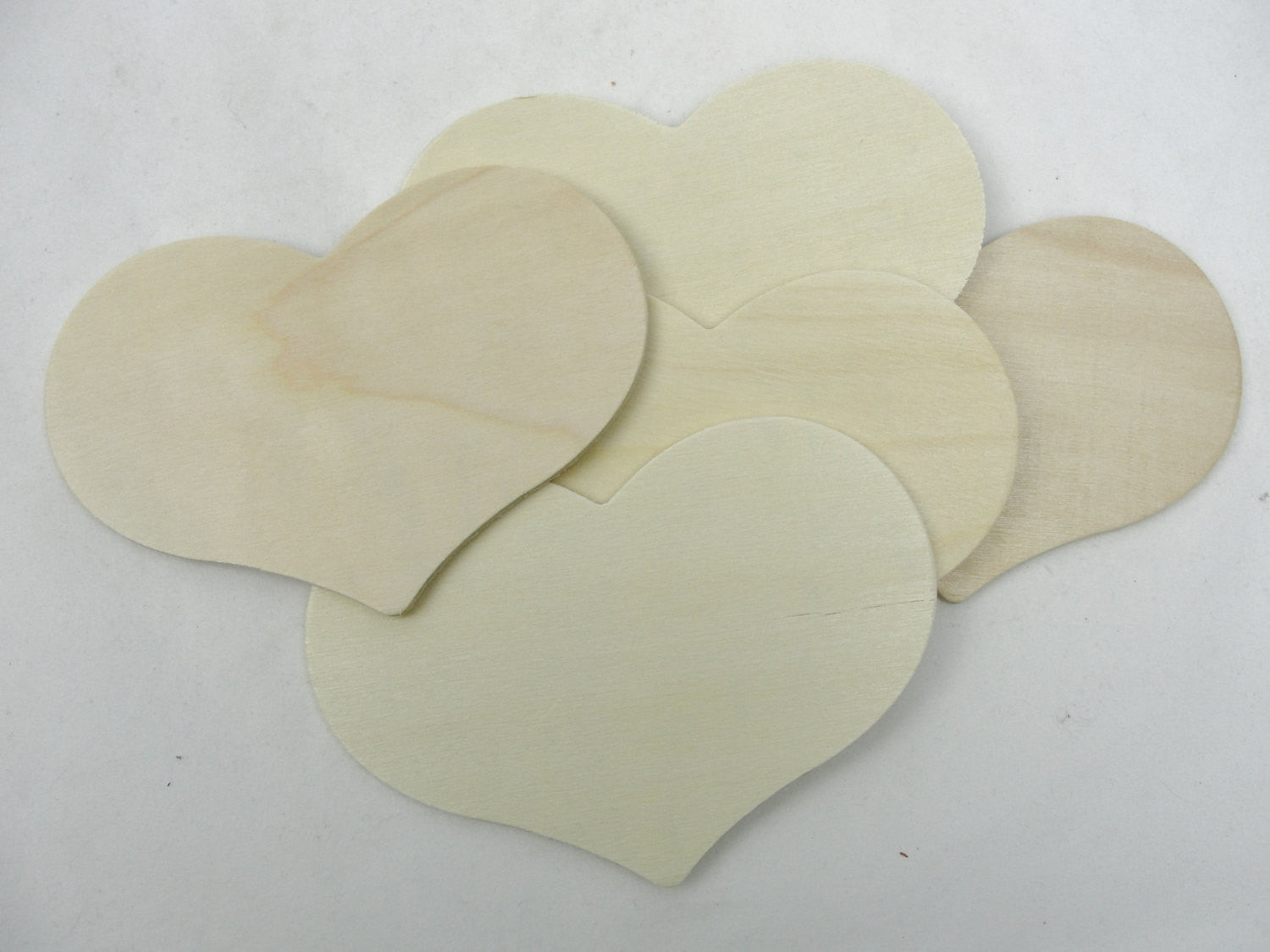 5 wooden country hearts 4 1/2" wide 3 1/4" tall 1/8" thick unfinished - Wood parts - Craft Supply House