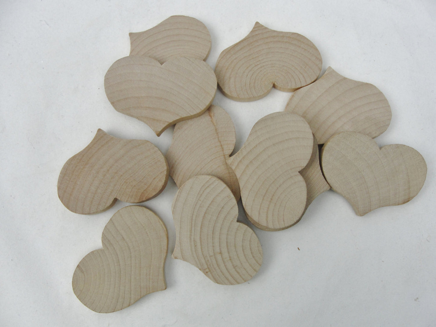Wooden country hearts 1 1/2" wide 1 1/8" tall 3/16" thick unfinished - Wood parts - Craft Supply House