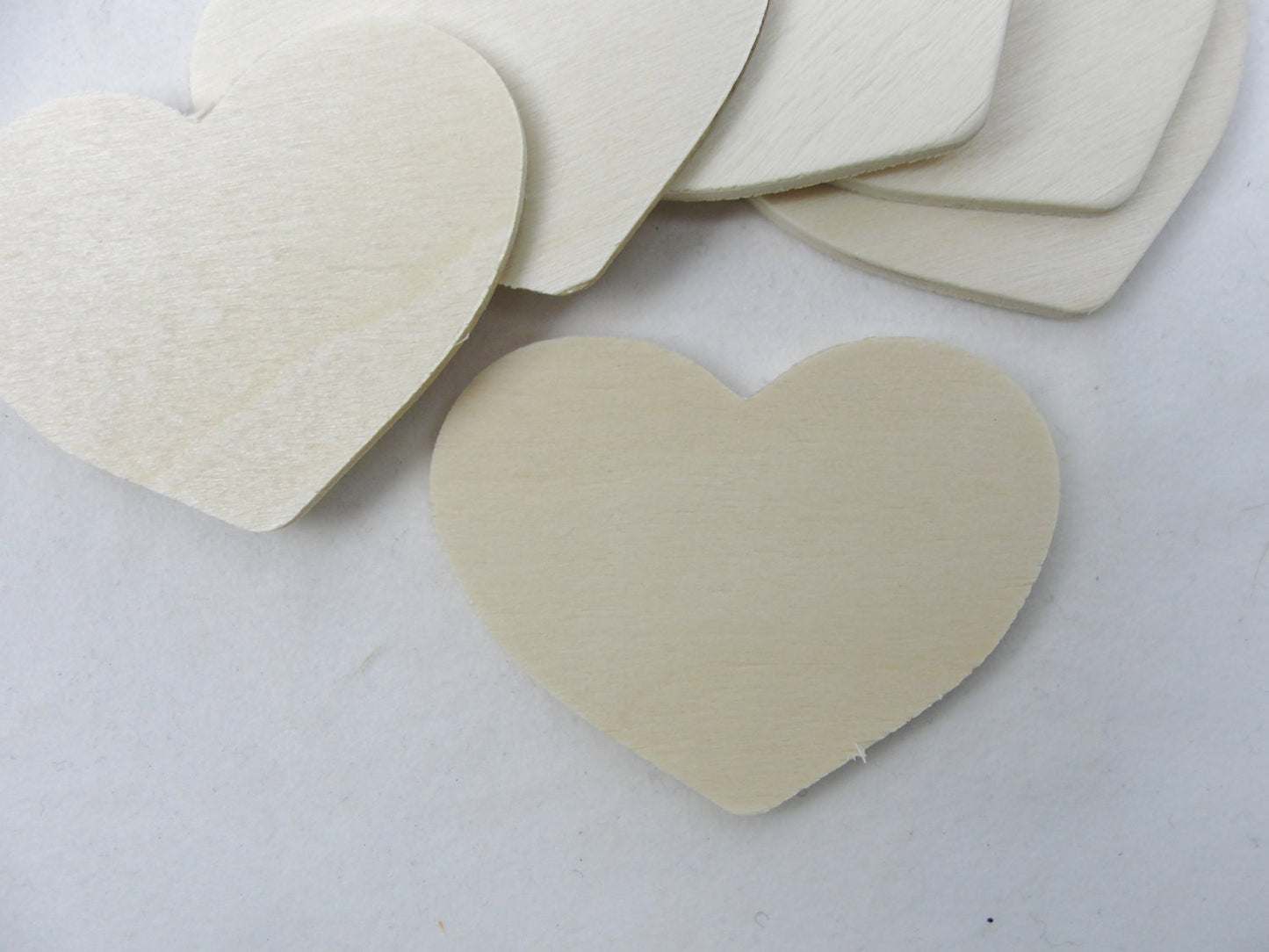 6 wooden country hearts 2" wide 1 1/2" tall 1/8" thick unfinished - Wood parts - Craft Supply House