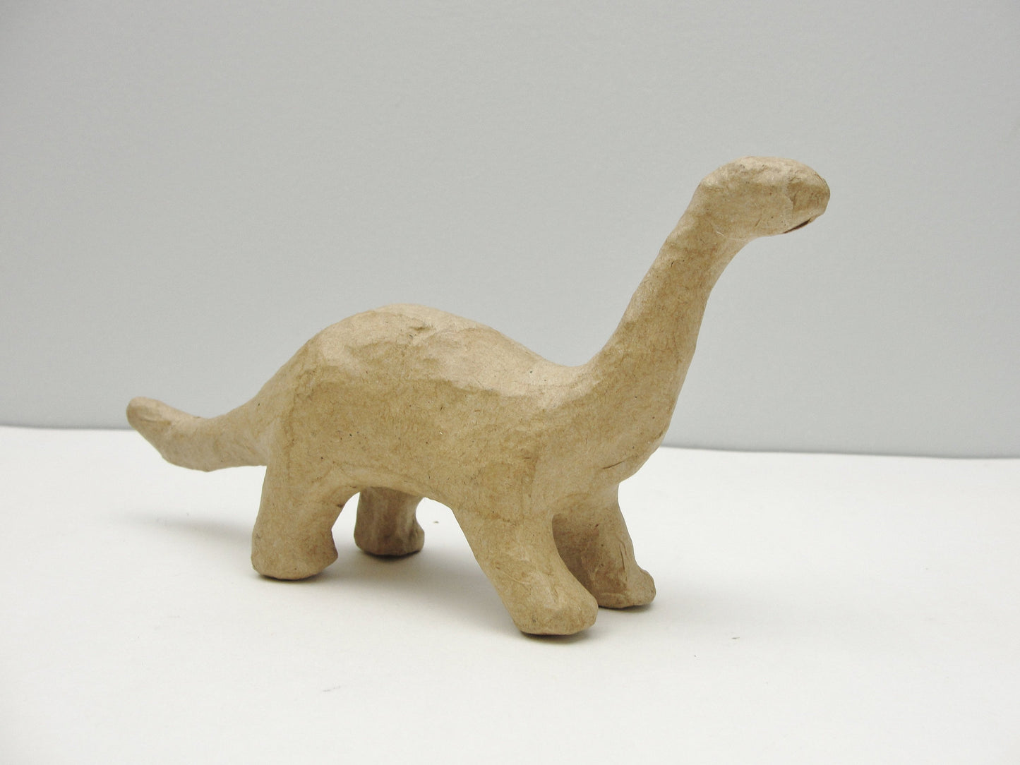 Small paper mache brontosaurus dinosaur - Paper Mache - Craft Supply House