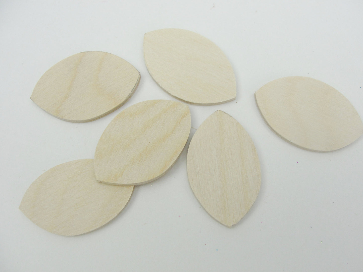 Wooden football 1 1/2" x 1/8" set of 6 - Wood parts - Craft Supply House