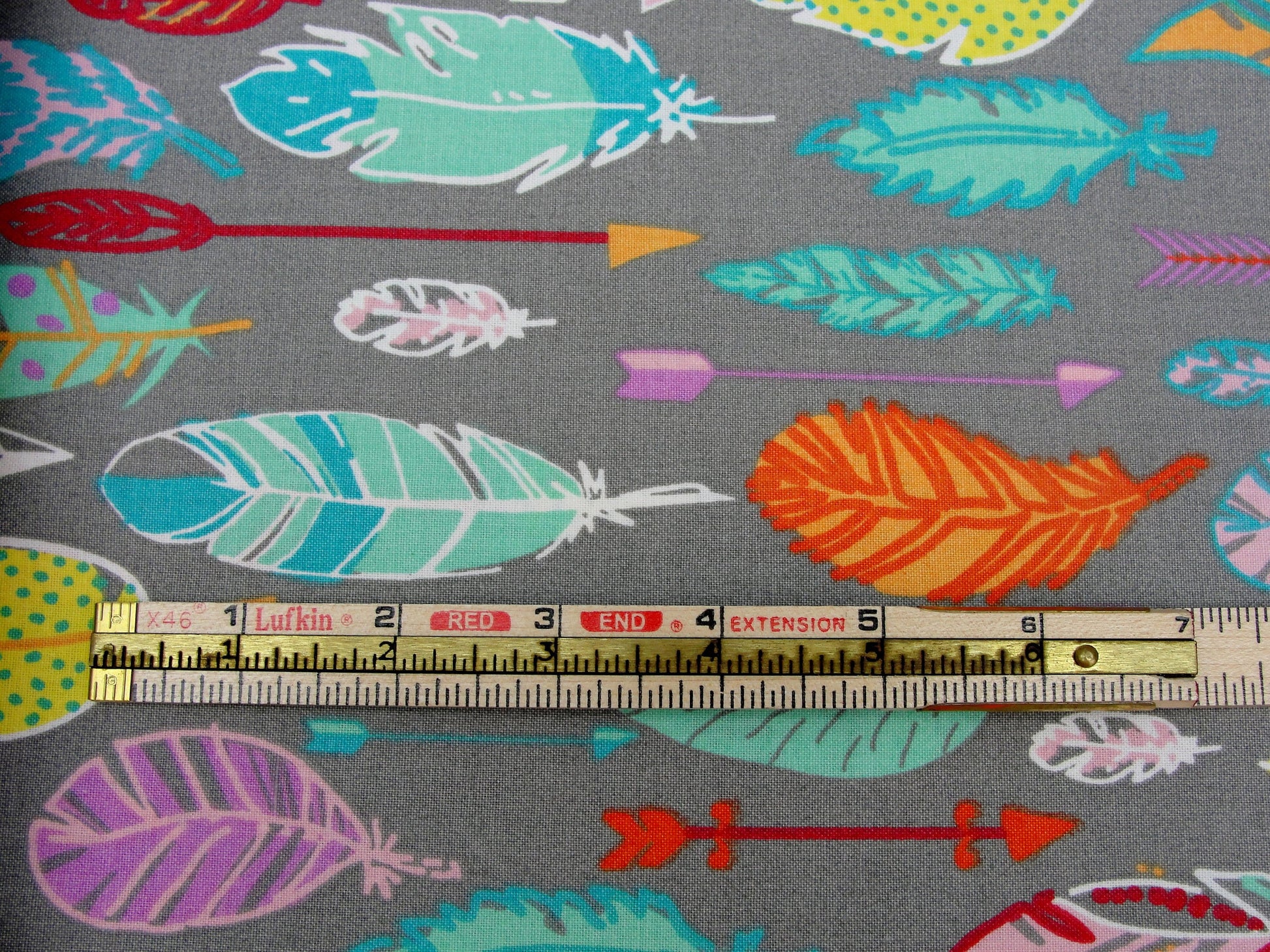 3 wishes feathers and arrows pastel on gray fabric yardage - Fabric - Craft Supply House