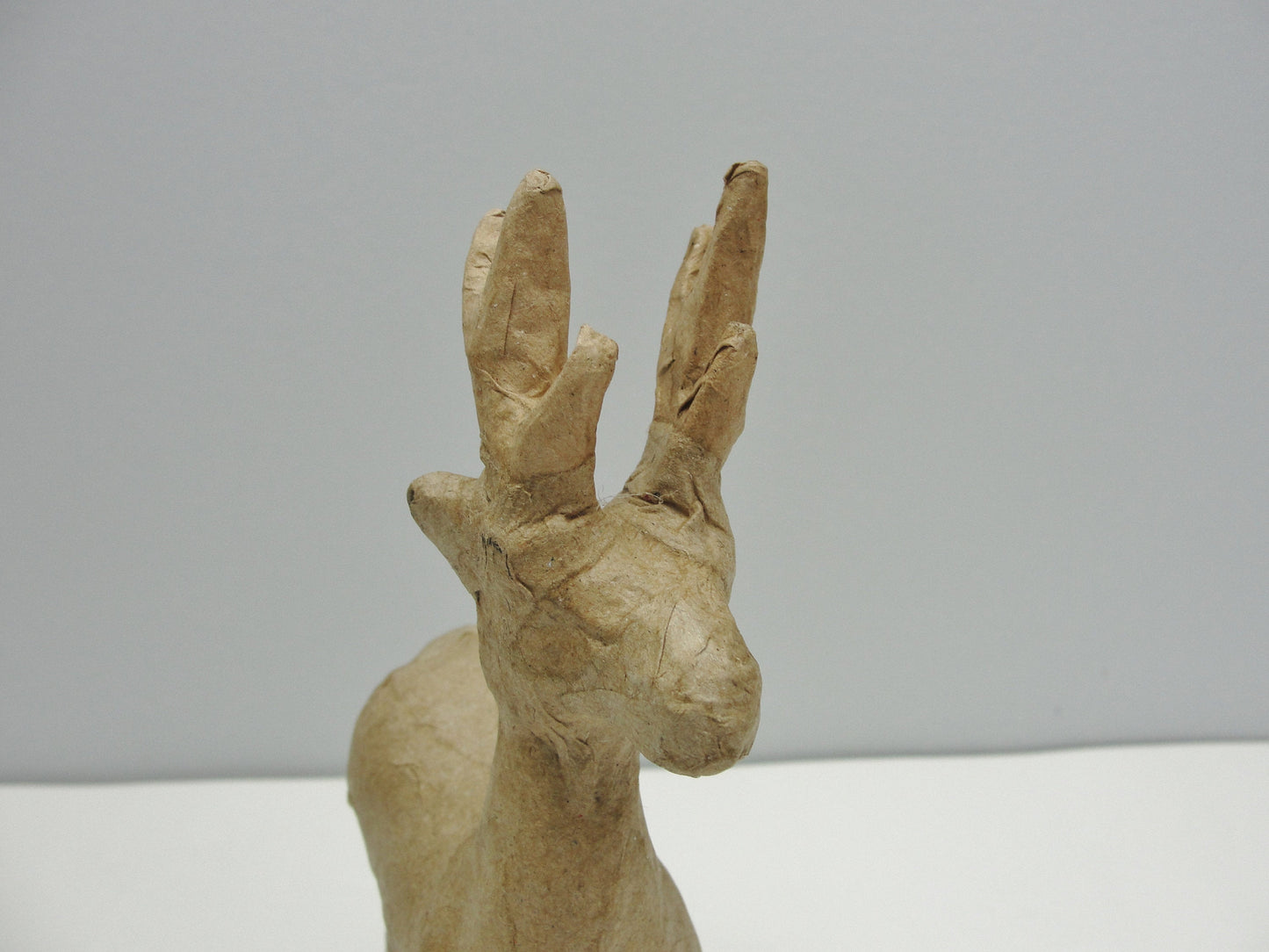 Small paper mache reindeer