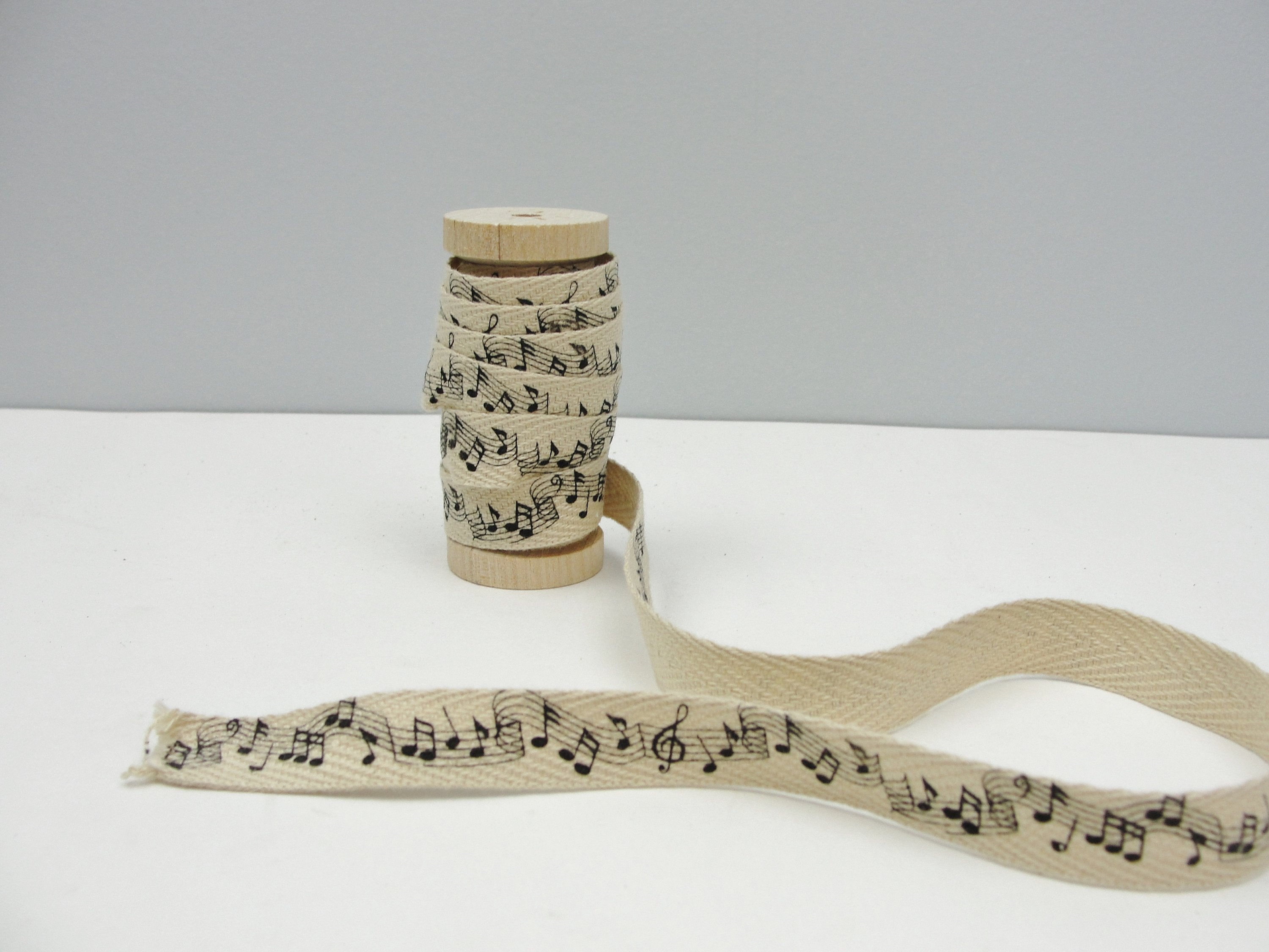Music notes twill tape 3 yards on wooden spool – Craft Supply House