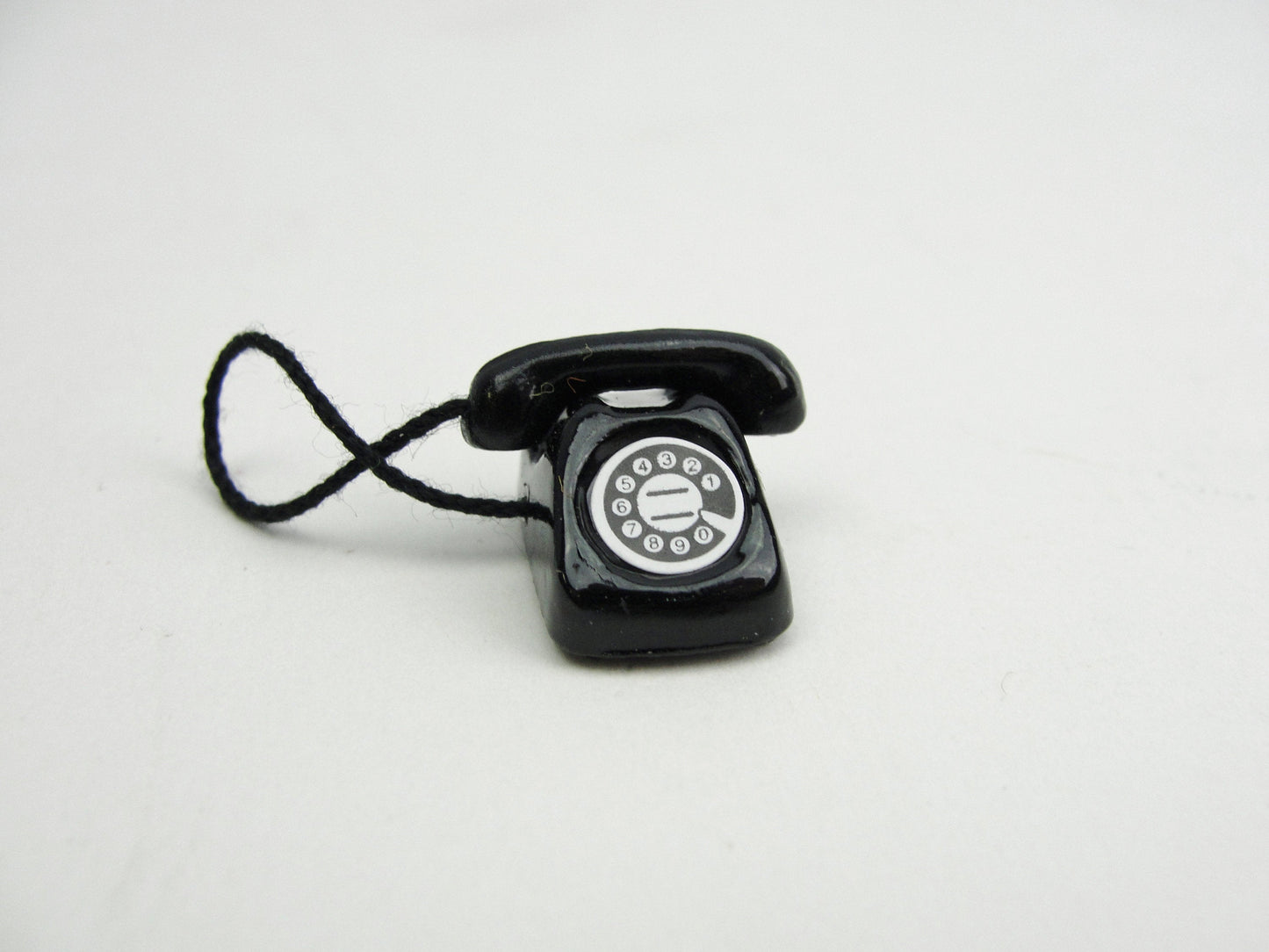 Dollhouse miniature black or red telephone