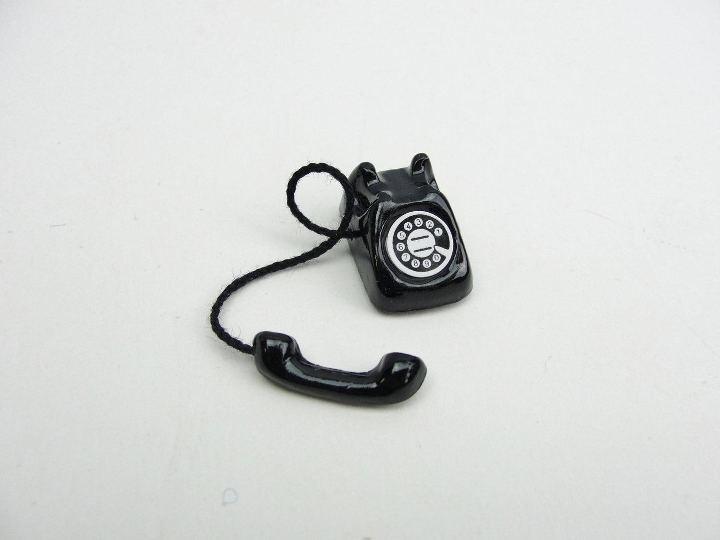 Dollhouse miniature black or red telephone