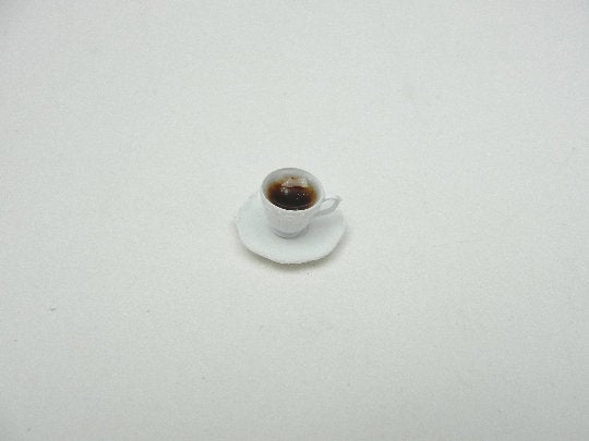 Dollhouse miniature coffee cups and saucers