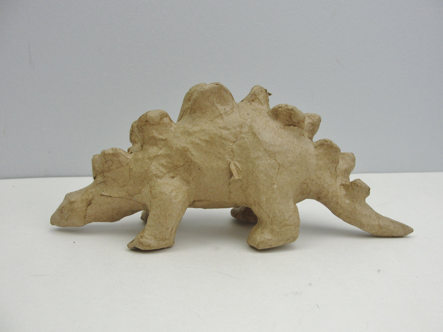 Small Paper mache Stegosaurus dinosaur