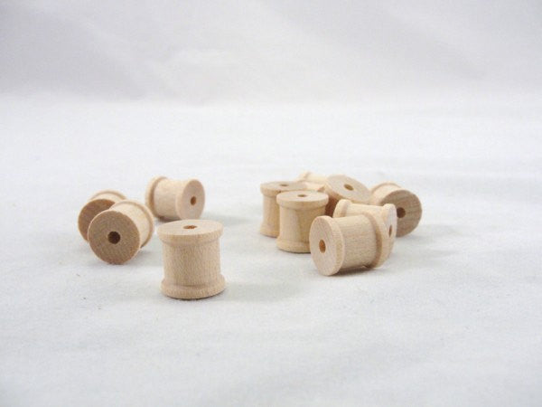 Little wooden spools 1/2 inch set of 12 – Craft Supply House