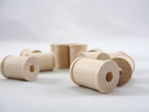 Little wooden spools 1 inch set of 12 - Wood parts - Craft Supply House
