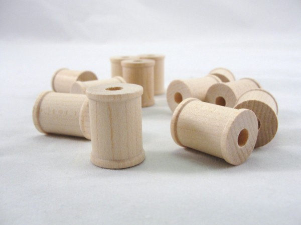 Little wooden spools 1 inch set of 12 - Wood parts - Craft Supply House