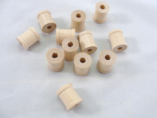 Small wooden spools 3/4 inch set of 12 - Wood parts - Craft Supply House