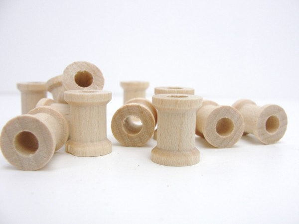 Miniature wooden spools 5/8 inch set of 12 - Wood parts - Craft Supply House