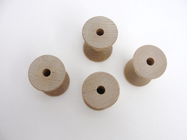 Wooden spool 1 15/16" tall set of 4 - Wood parts - Craft Supply House