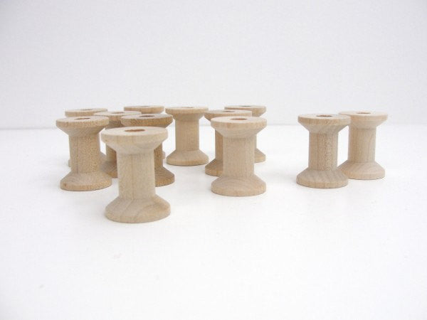 12 Wooden spools 11/8" tall - Wood parts - Craft Supply House