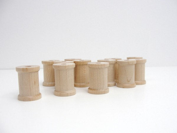 Wooden spools 1 3/16 inch set of 12 - Wood parts - Craft Supply House