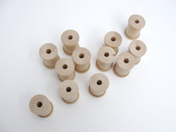 Wooden spools 1 3/16 inch set of 12 - Wood parts - Craft Supply House