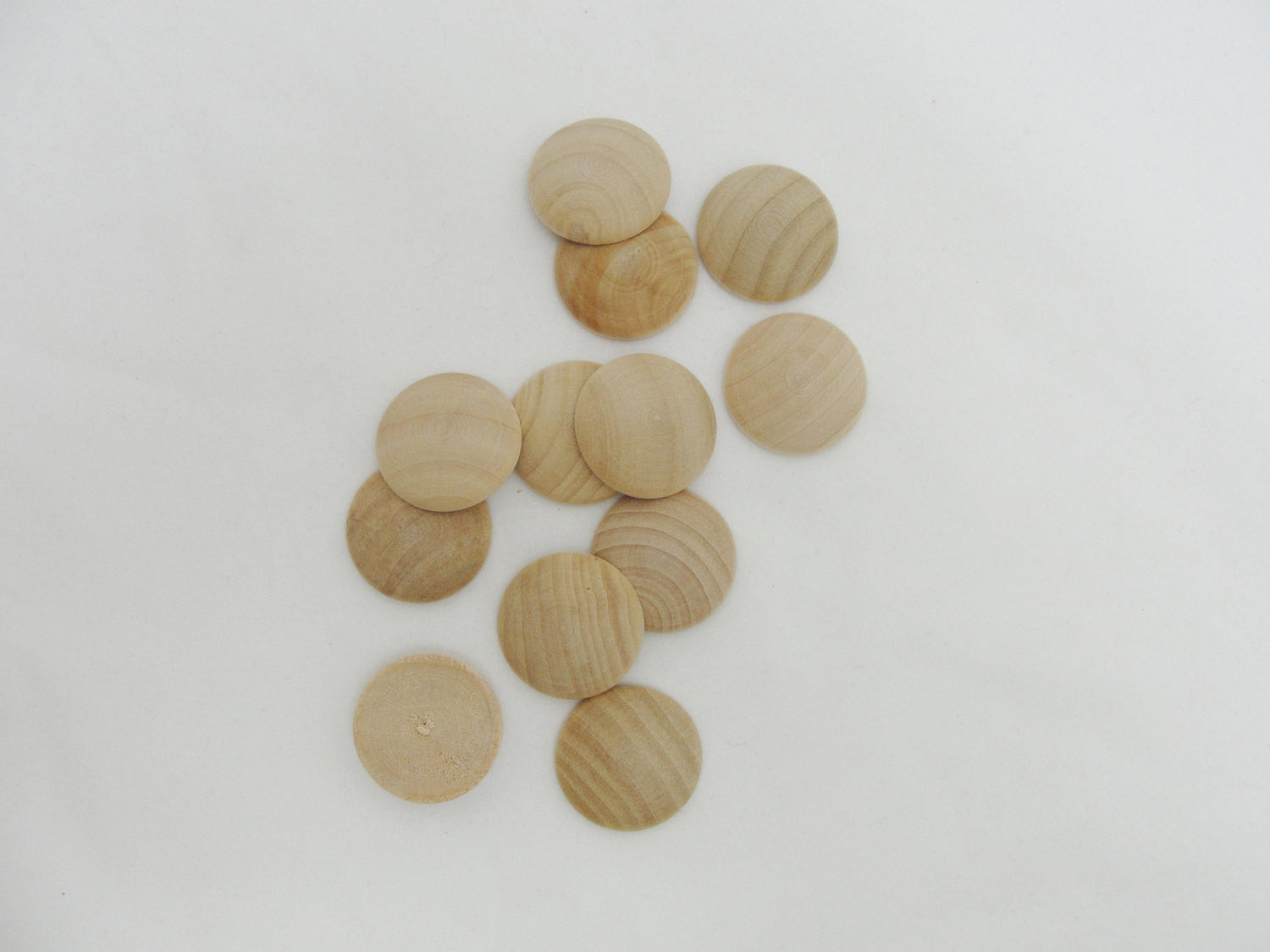Domed wooden Circles 1" wide x 3/16" thick set of 12 - Wood parts - Craft Supply House