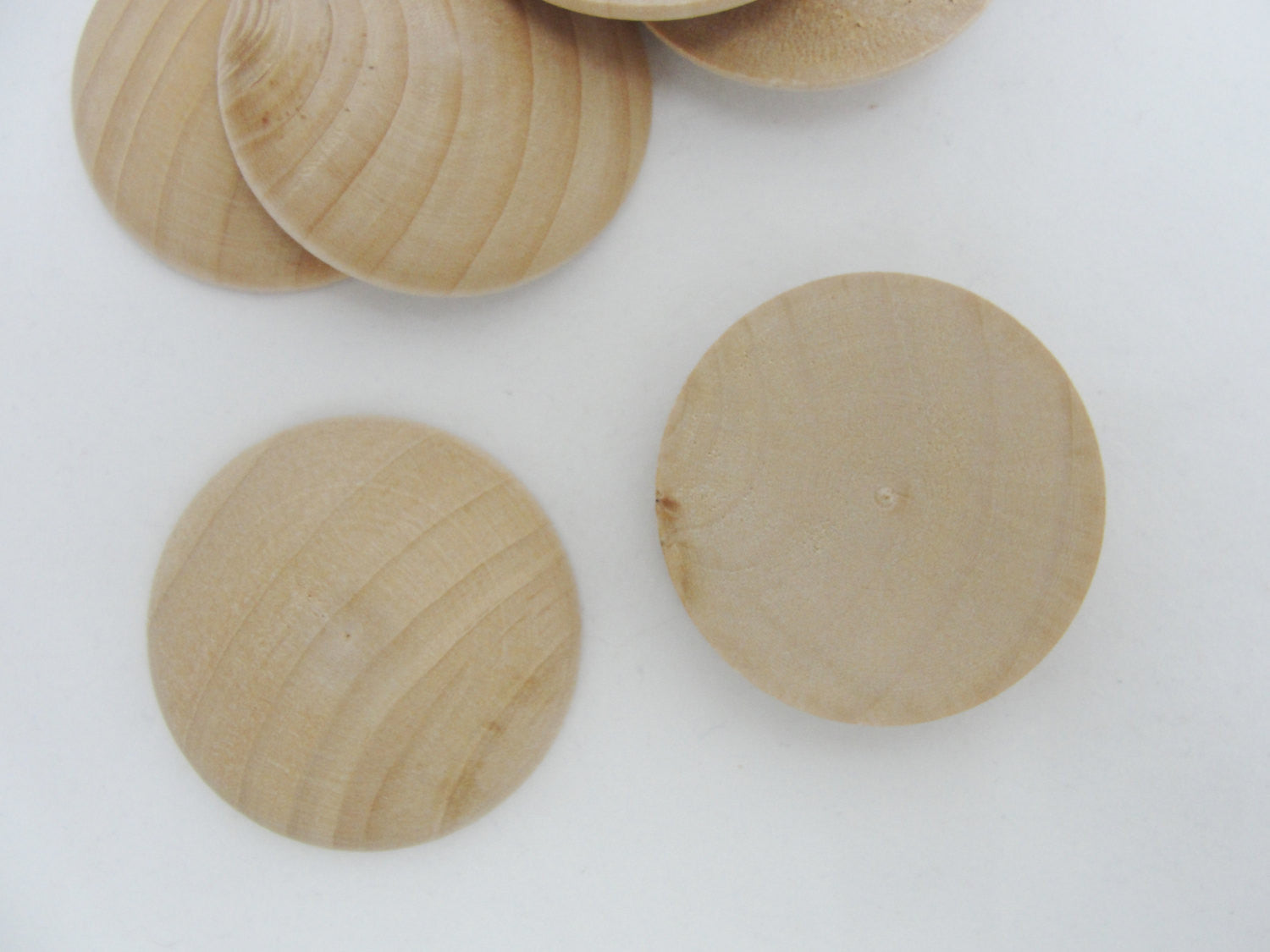 Wooden domed disc Circles 1 1/2" wide x 5/16" thick set of 12 - Wood parts - Craft Supply House